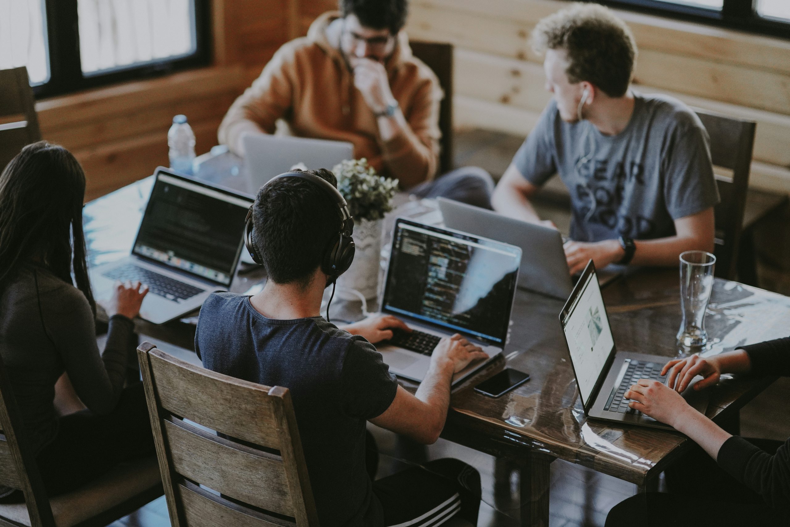 Apprentices working at laptops